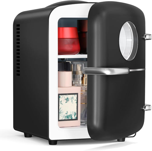 Black and white mini refrigerator with door open, showing interior with items.
