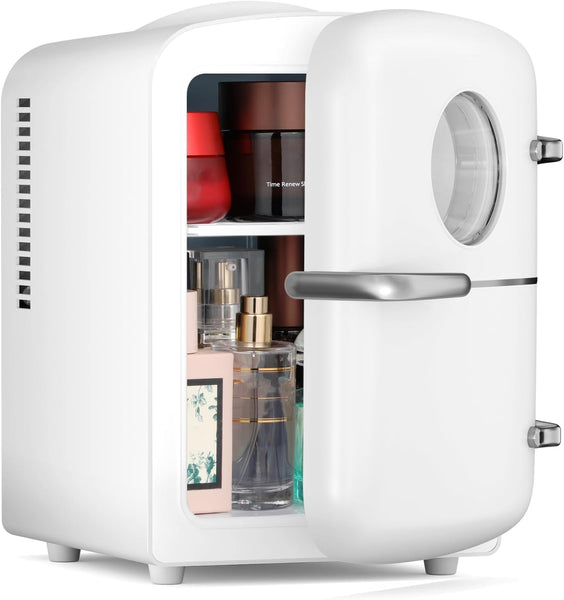 Small white refrigerator with open door displaying various items inside.