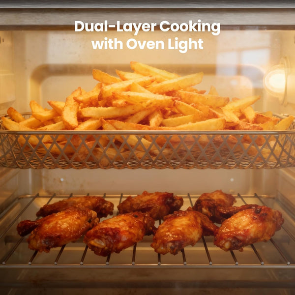 Oven with two trays of food: fries on the top and chicken wings on the bottom, labeled 'Dual-Layer Cooking with Oven Light'.