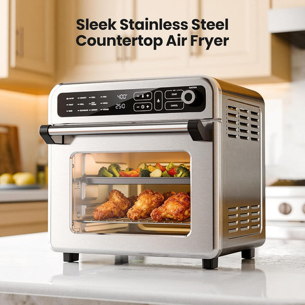Sleek stainless steel countertop air fryer with digital display and food inside, set against a kitchen background.