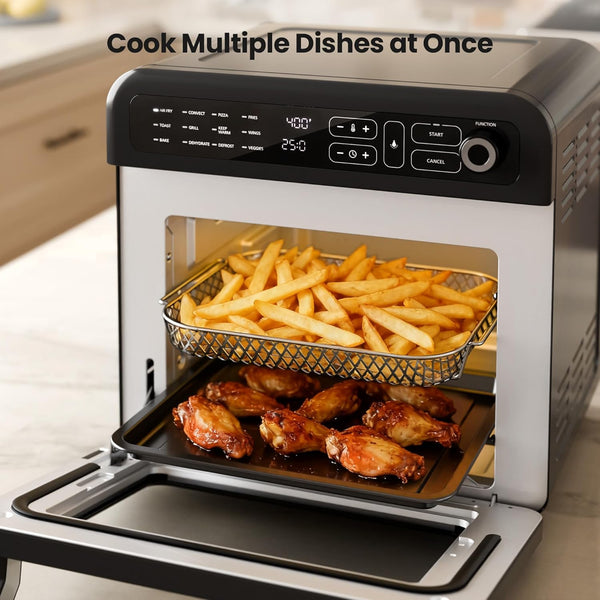 Multifunctional oven with chicken wings and fries inside, set against a kitchen background.