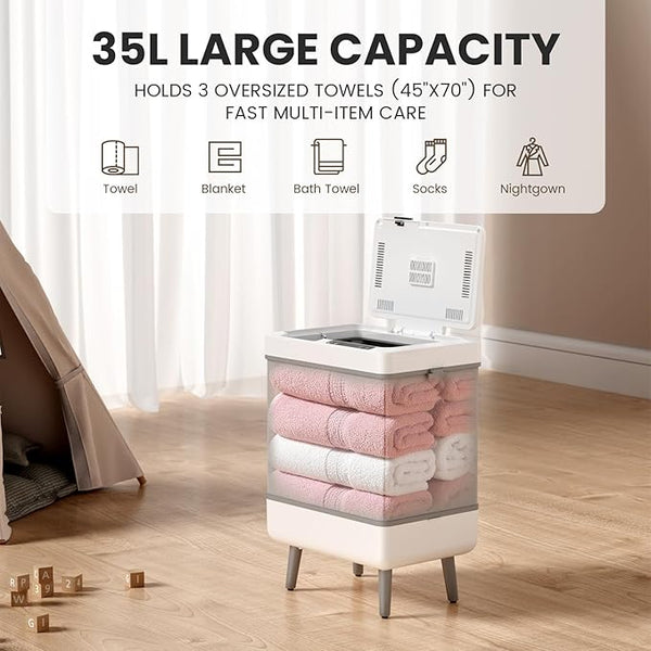 Portable washing machine with towels on a wooden floor, labeled '35L Large Capacity'.