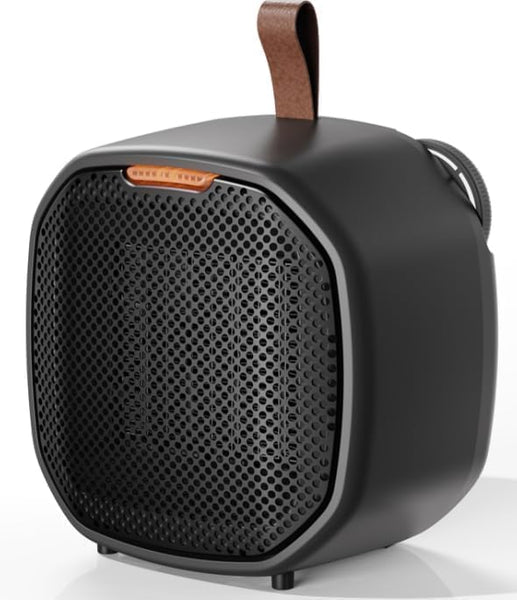 Black portable speaker with a brown handle on a white background