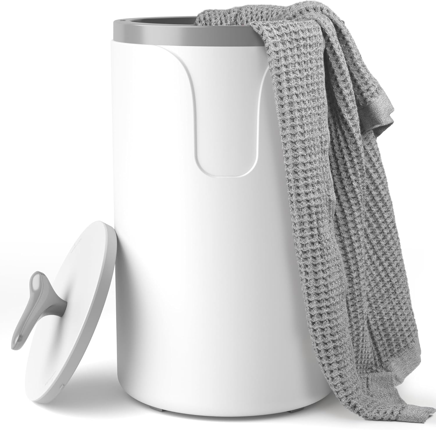 White laundry basket with a gray lid and a gray towel draped over it on a white background
