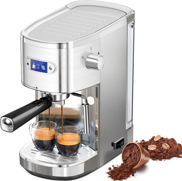 Silver espresso machine with two glasses of coffee and coffee grounds on a white background