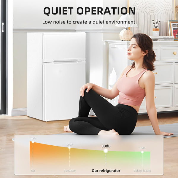 Woman practicing yoga in a room with a refrigerator labeled 'Quiet Operation' and noise level indicator.