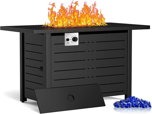 Black metal fire pit table with flames and blue fire glass on a white background
