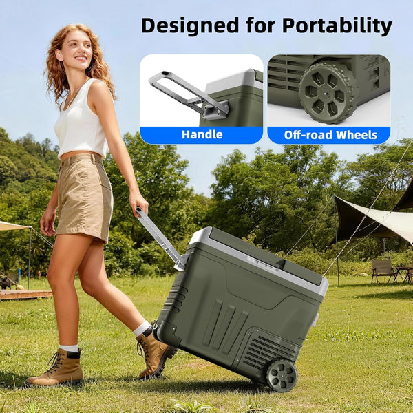 Woman pushing a portable cooler with handle and off-road wheels in a park setting