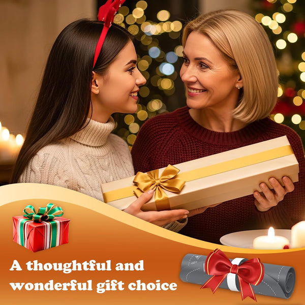 Two women exchanging a gift with festive lights and decorations in the background