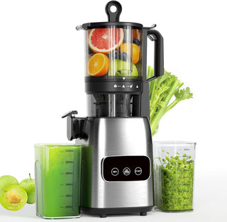 Stainless steel juicer with fruits and vegetables, displaying fresh juice and pulp on a white background.