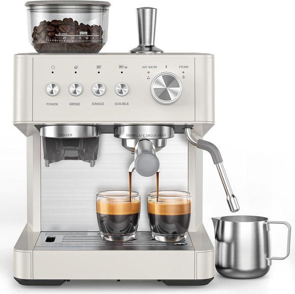 Espresso machine with two glasses of coffee and a milk pitcher on a white background
