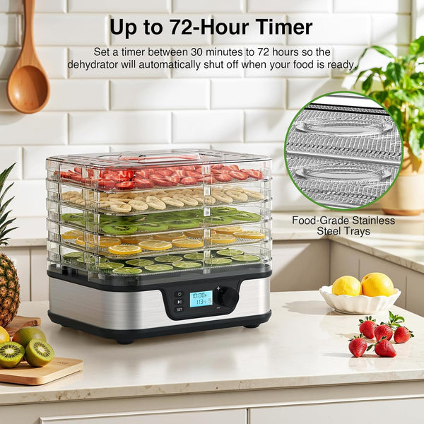 Food dehydrator with timer feature on a kitchen counter, surrounded by fruits and vegetables.