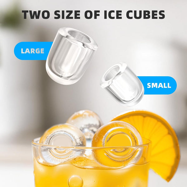 Ice cube trays with large and small compartments shown in a glass of orange juice.
