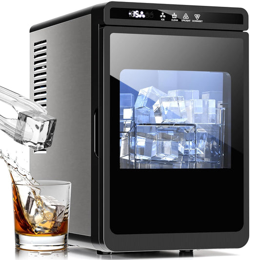 Ice maker with ice cubes and a glass of liquid on a white background